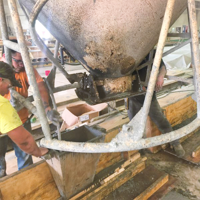  Precasteel crew fabricating and pouring StayPanel™ forms in shop